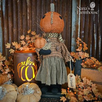 Ursala Pumpkin Girl Doll holding Pumpkin